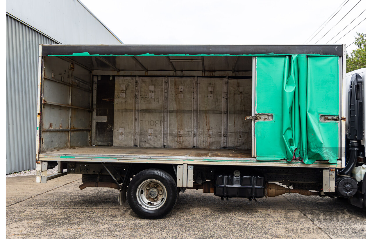 11/2009 Isuzu NPR200 Medium 4x2 NH C/Chas Curtain Side White Turbo Diesel 5.2L