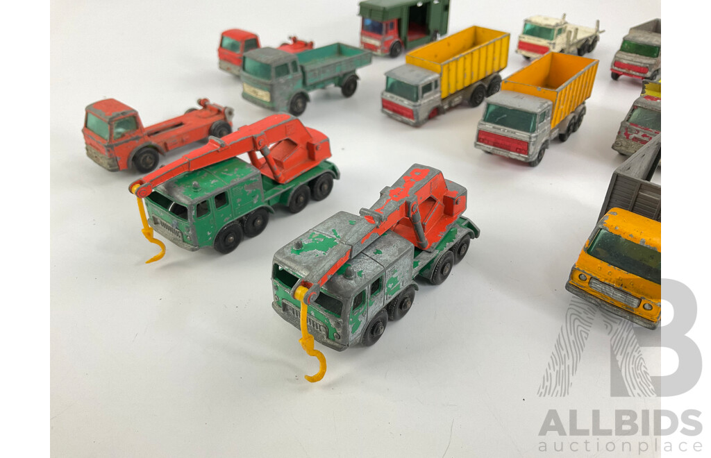 Collection of Vintage Diecast Matchbox Trucks Including Eight Wheel Crane, Grit Spreading Truck, Scaffolding Truck, Cattle Truck