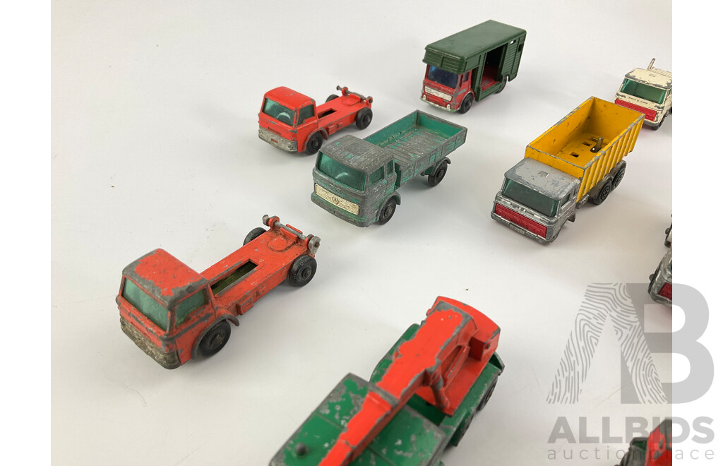 Collection of Vintage Diecast Matchbox Trucks Including Eight Wheel Crane, Grit Spreading Truck, Scaffolding Truck, Cattle Truck