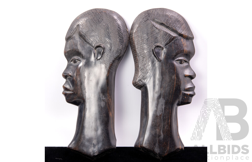 Pair Hand Carved African Ebony Wall Plaques