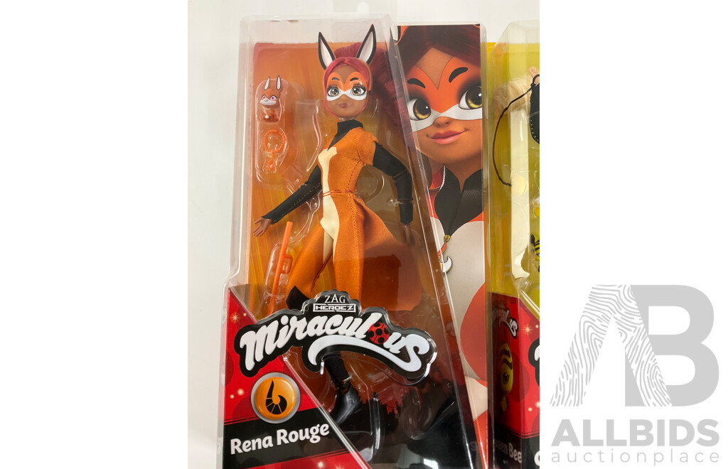 Three Boxed Miraculous Dolls