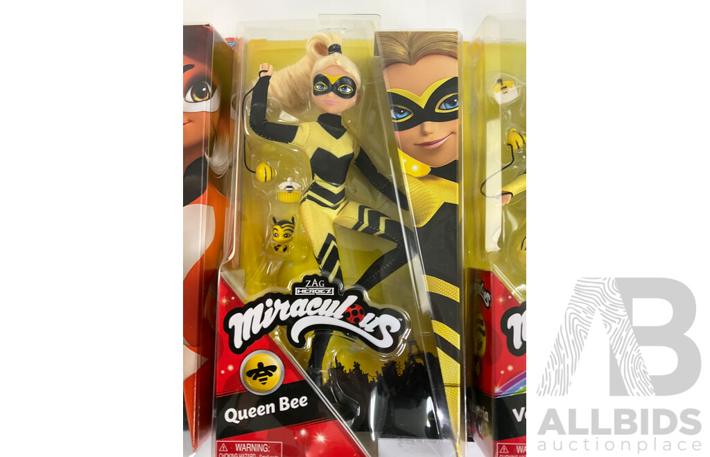 Three Boxed Miraculous Dolls