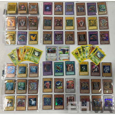 Collection of Pokémon TCG Cards and Yu-Gi-Oh Singles in Binder Pages