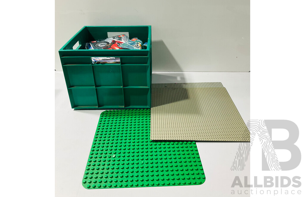 Collection of LEGO Instruction Manuals and Baseplates Including Two 48x48 Stud Grey Baseplates and 22x22 Stud Duplo Baseplate