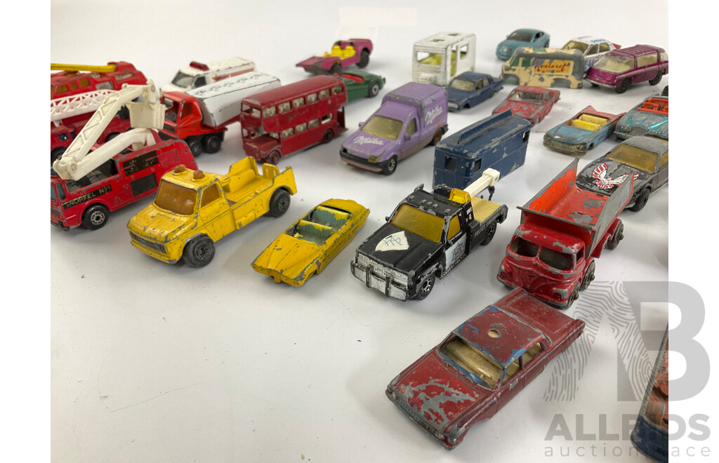 Collection of Diecast Matchbox, Corgi and Playart Vehicles Including Fire Trucks, Police Cars and Sports Cars