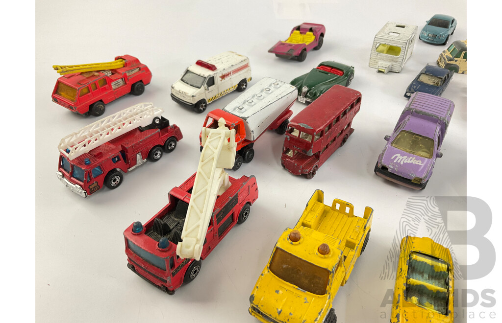 Collection of Diecast Matchbox, Corgi and Playart Vehicles Including Fire Trucks, Police Cars and Sports Cars