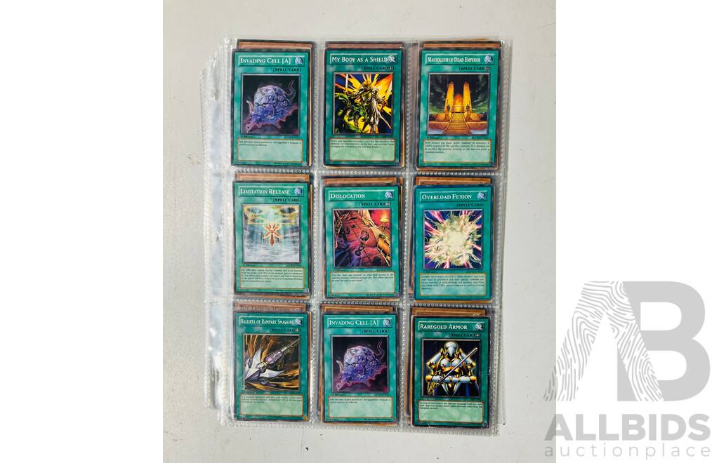 Collection of Yu-Gi-Oh Singles in Binder Pages Including Pot of Greed and More