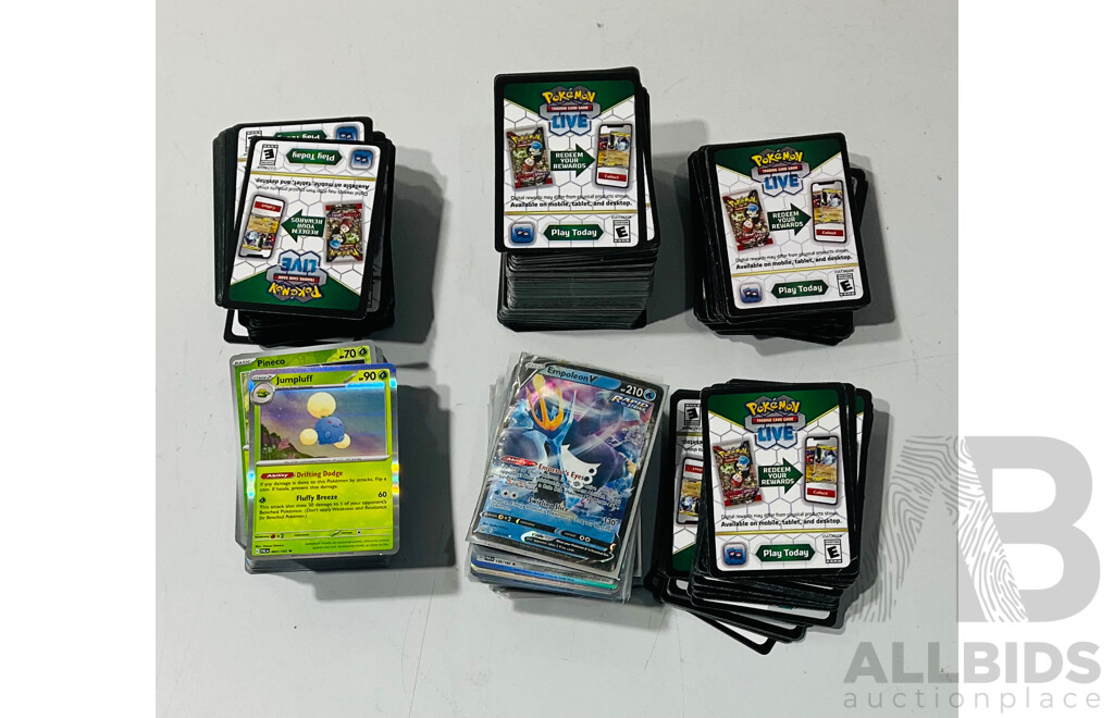 Collection of Mostly Foil Pokémon Tcg Cards and Pokémon Advertisements