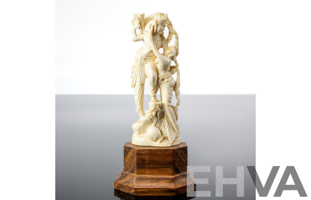Antique Indian Hand Carved Ivory Figure of Krishna in Amorous Mood on Wooden Stand