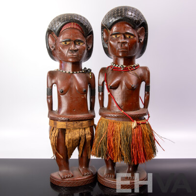 Vintage Pair Carved Hard Wood Melanesian Male and Female Figures with Grass Skirt Detail