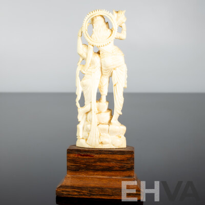 Antique Indian Hand Carved Ivory Figure of Krishna in Amorous Mood on Wooden Stand