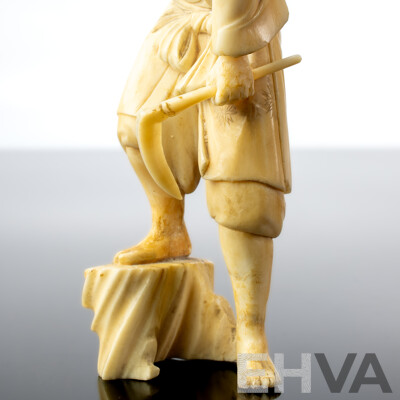 Antique Japanese Hand Carved Ivory Okimono of Man with Sickle and Monkey