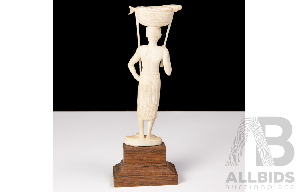 Antique Japanese Hand Carved Ivory Okimono of Fisherman with Fish in Basket, on Wooden Stand