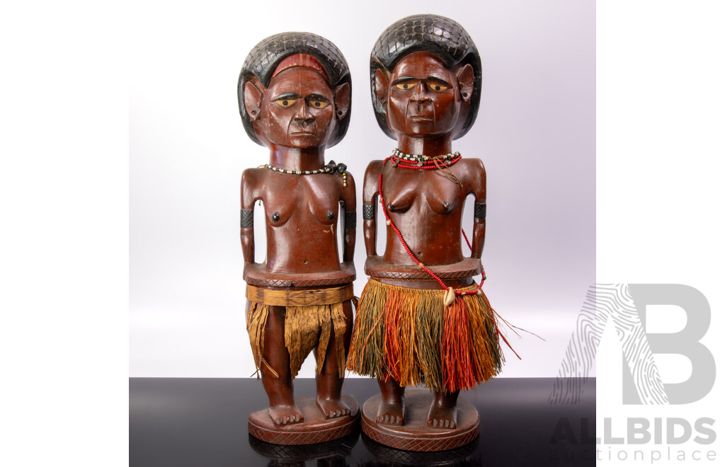 Vintage Pair Carved Hard Wood Melanesian Male and Female Figures with Grass Skirt Detail