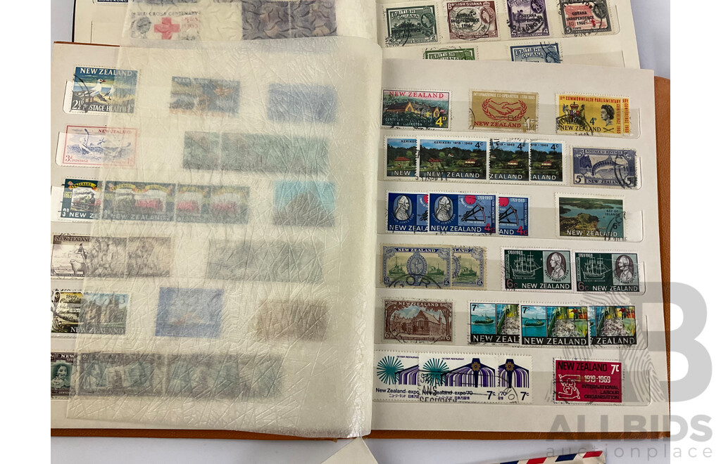 Five Albums of Vintage International Stamps Including New Zealand, Great Britain, Romania, Tonga, Pakistan, Hong Kong, France, Fiji and More with Singapore and Malaysia First Day Covers
