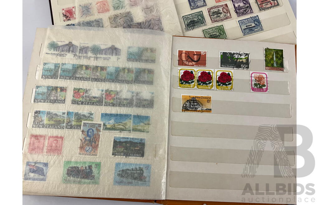 Five Albums of Vintage International Stamps Including New Zealand, Great Britain, Romania, Tonga, Pakistan, Hong Kong, France, Fiji and More with Singapore and Malaysia First Day Covers