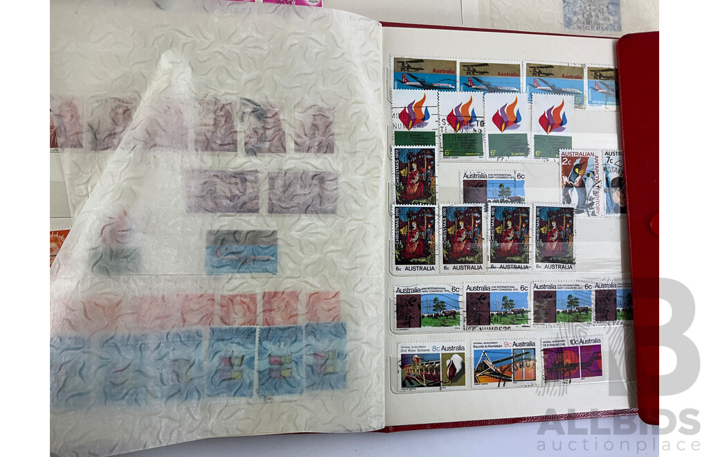 Seven Albums of Vintage International Stamps Including Australia, Poland, Singapore, Malaysia, Jamaica, Trinidad, USA, Canada, Brazil, Ireland and More