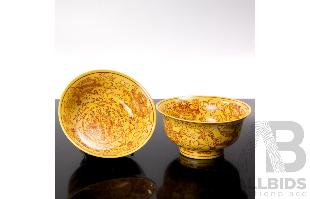 Pair Antique Chinese Porcelain Bowls with Yellow Ground and Dragon Motif, Apocryphal Qianlong Character Marks to Base