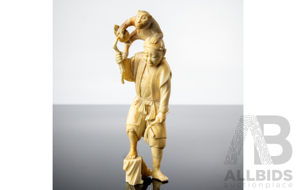 Antique Japanese Hand Carved Ivory Okimono of Man with Sickle and Monkey