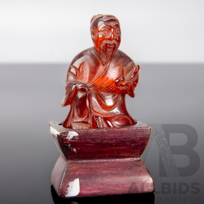 Rare Antique Chinese Carved Red Amber Figure with Pipe on Wooden Stand