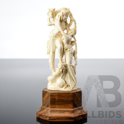 Antique Indian Hand Carved Ivory Figure of Krishna in Amorous Mood on Wooden Stand