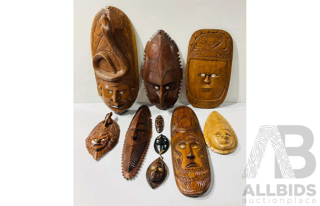 Collection Asian and PNG Carved Wooden Masks