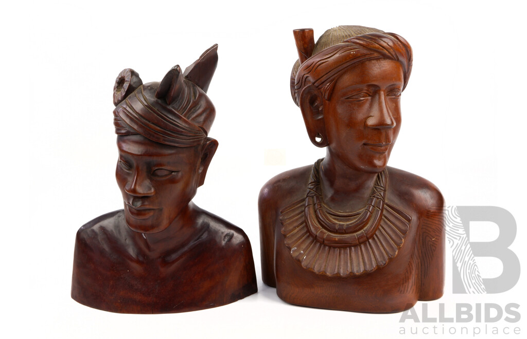 Two Carved Indonesian Wooden Busts