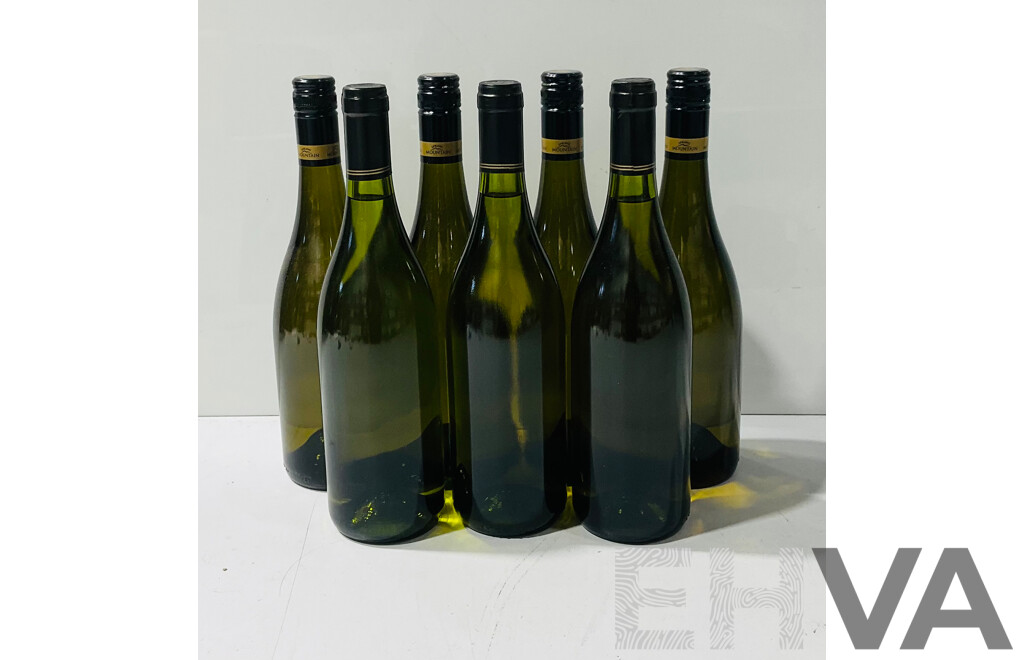 Collection of Seven Unlabelled Bottles of White Wine