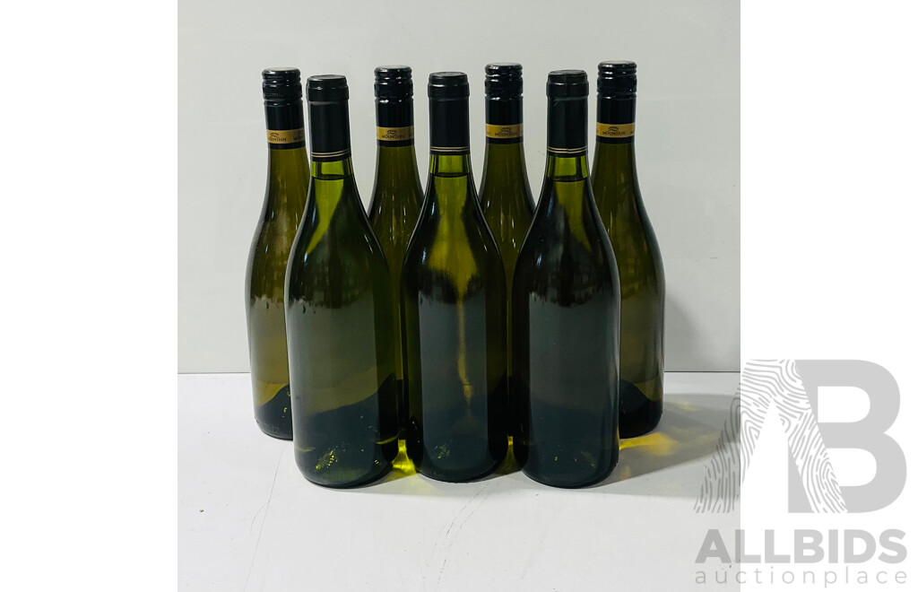 Collection of Seven Unlabelled Bottles of White Wine