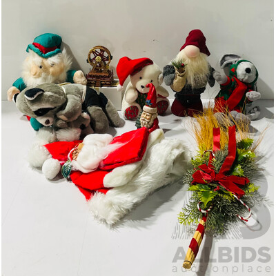 Collection of Christmas Decorations Including Hats, Statues and More