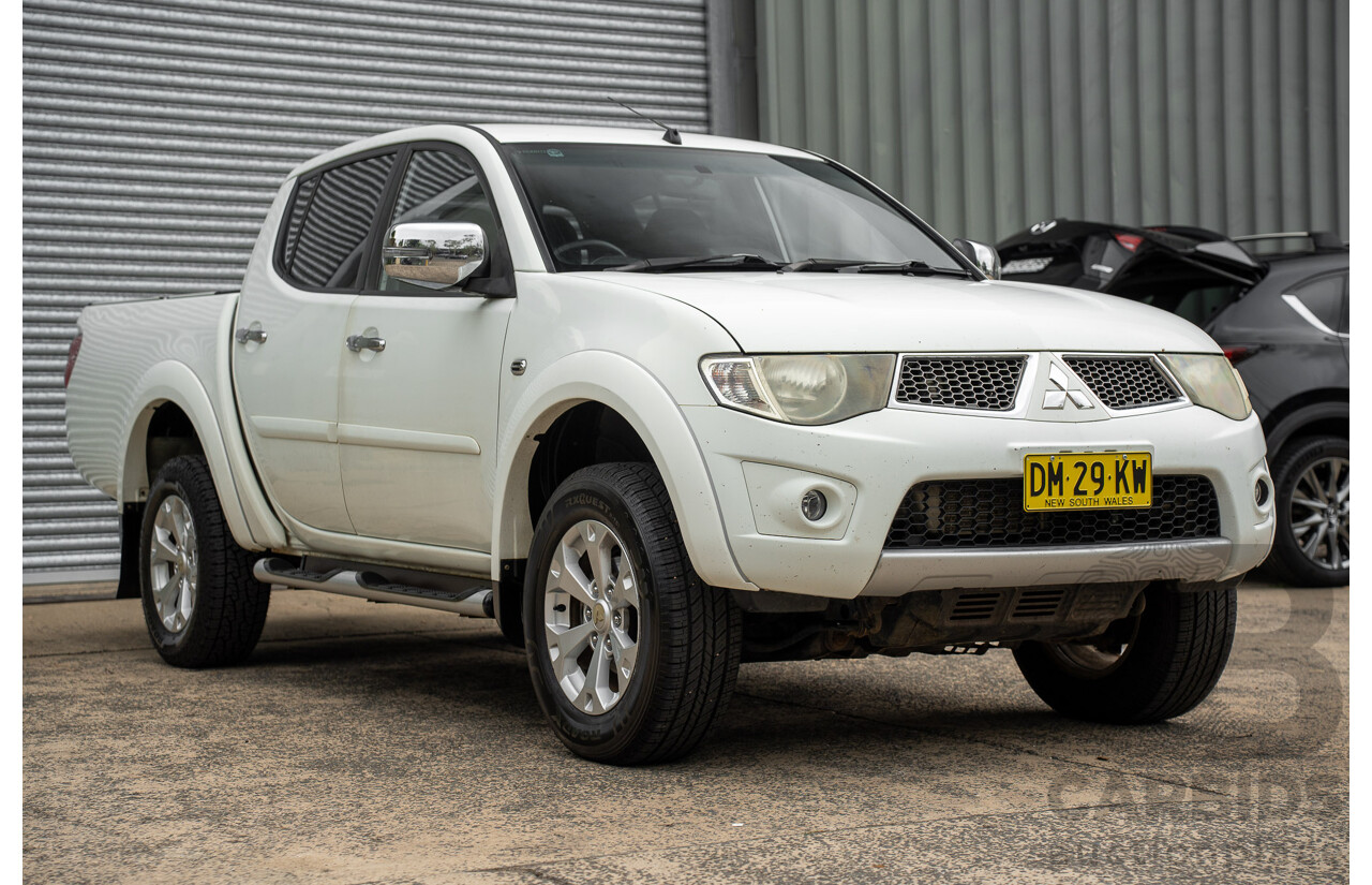 2/2015 Mitsubishi Triton GLX-R (4x4) MN MY15 Double Cab Utility White Turbo Diesel 2.5L