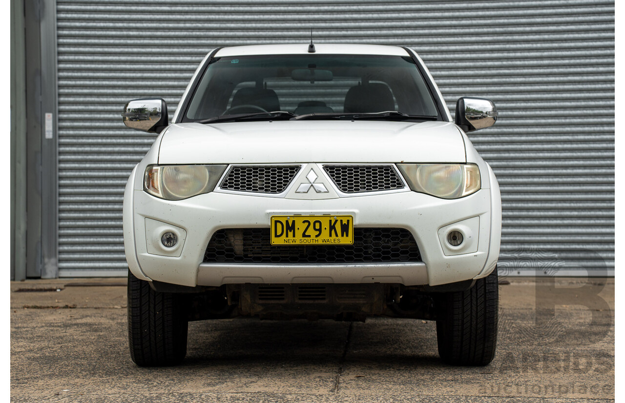 2/2015 Mitsubishi Triton GLX-R (4x4) MN MY15 Double Cab Utility White Turbo Diesel 2.5L