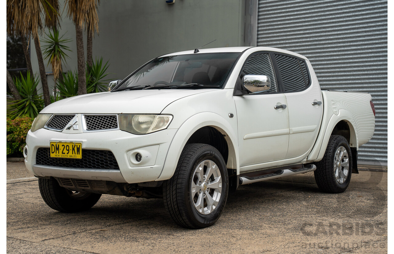 2/2015 Mitsubishi Triton GLX-R (4x4) MN MY15 Double Cab Utility White Turbo Diesel 2.5L