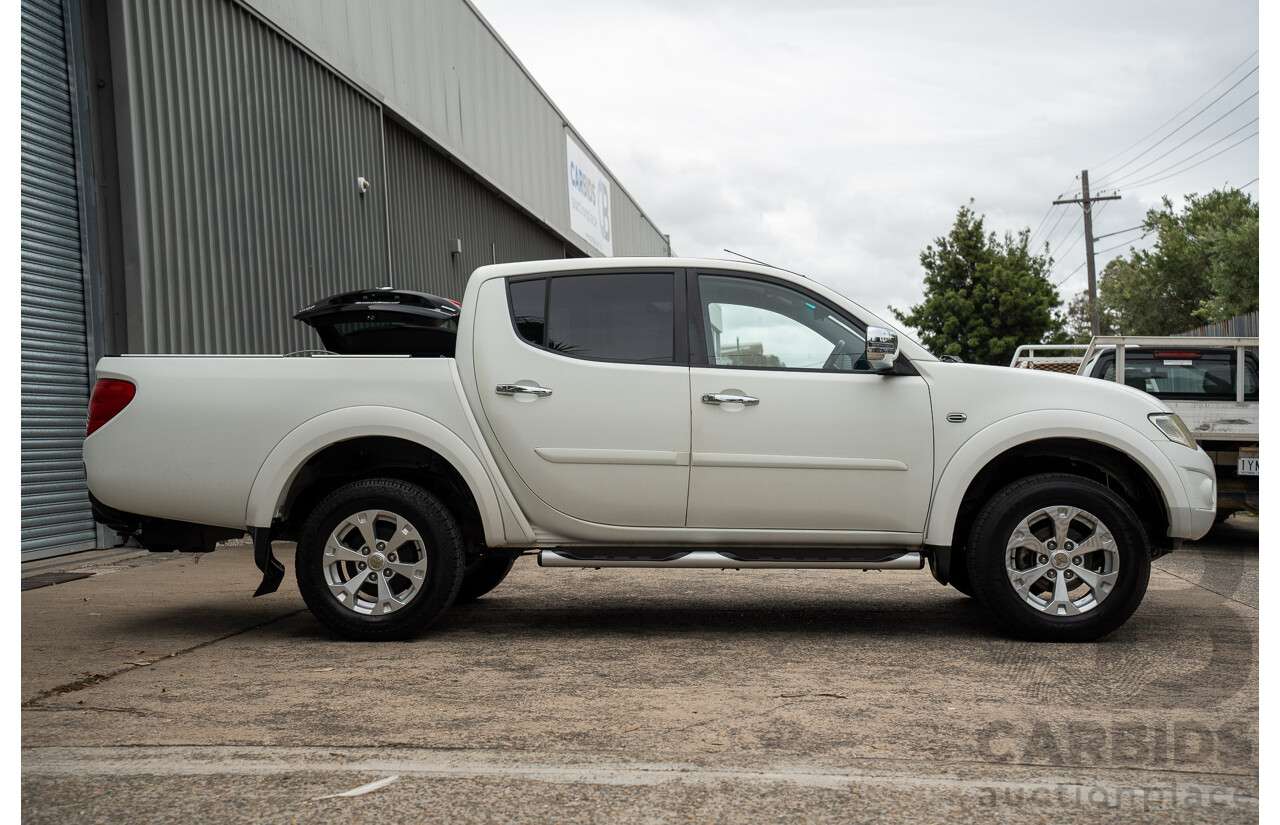 2/2015 Mitsubishi Triton GLX-R (4x4) MN MY15 Double Cab Utility White Turbo Diesel 2.5L