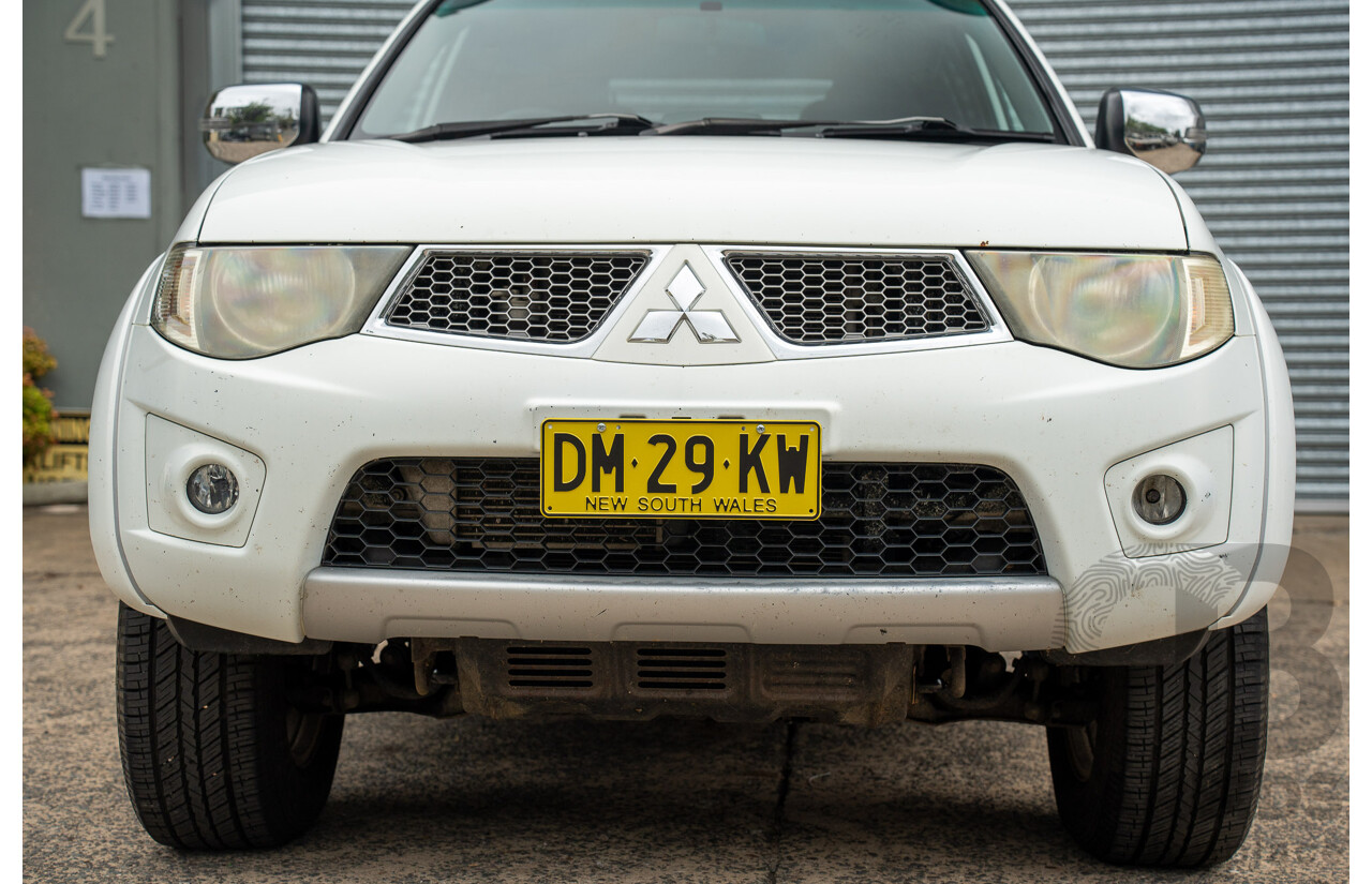 2/2015 Mitsubishi Triton GLX-R (4x4) MN MY15 Double Cab Utility White Turbo Diesel 2.5L