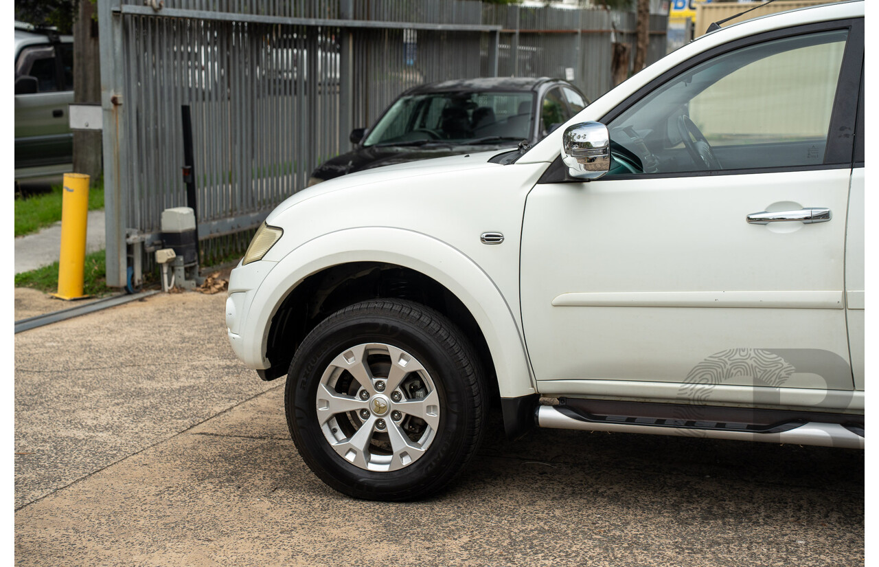 2/2015 Mitsubishi Triton GLX-R (4x4) MN MY15 Double Cab Utility White Turbo Diesel 2.5L