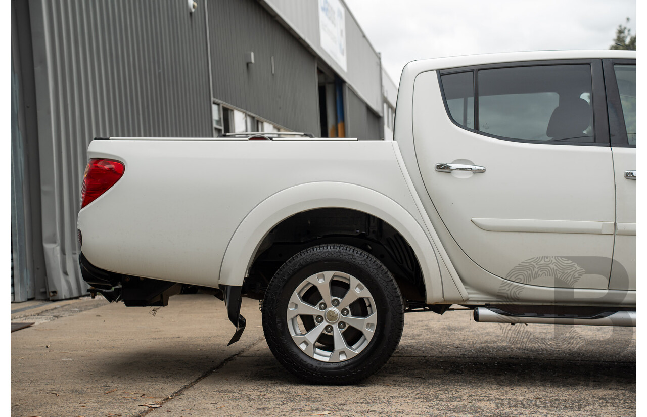 2/2015 Mitsubishi Triton GLX-R (4x4) MN MY15 Double Cab Utility White Turbo Diesel 2.5L