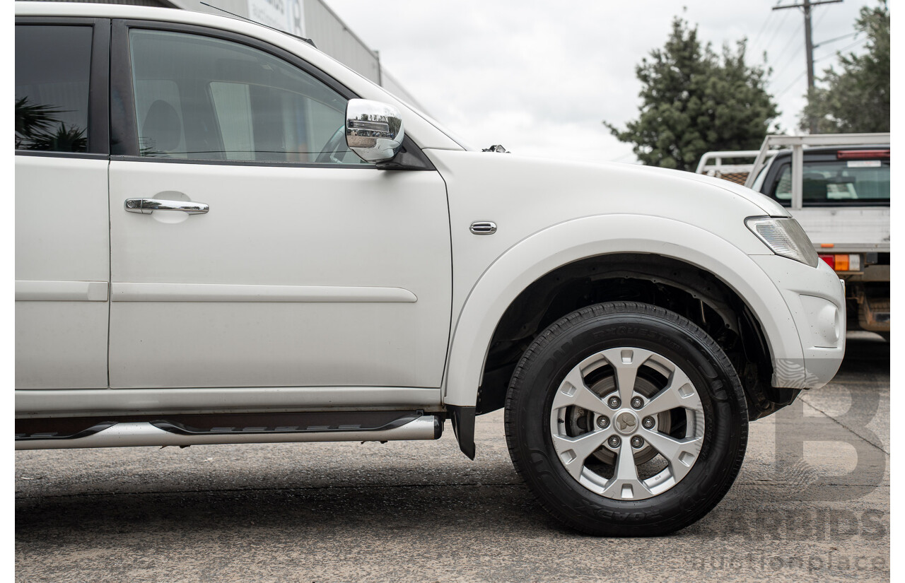 2/2015 Mitsubishi Triton GLX-R (4x4) MN MY15 Double Cab Utility White Turbo Diesel 2.5L