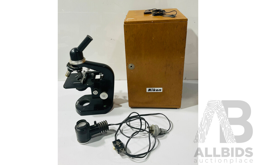 Vintage Nikon Microscope with Lockable Wooden Storage Case