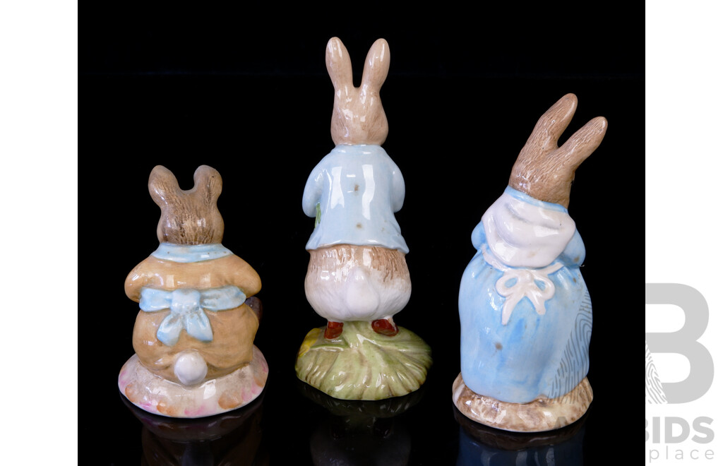 Collection Three Royal Albert Porcelain Beatrix Potter Figurines Comprising Peter with Daffodils, Old Mr Bouncer & Mrs Rabbit Cooking