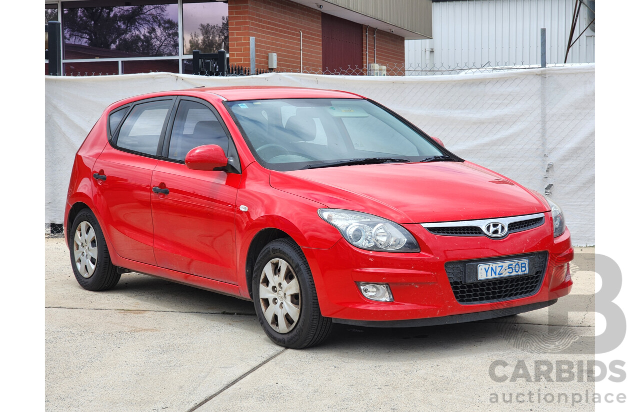 11/2010 Hyundai i30 SX FD MY10 5d Hatchback Red 2.0L