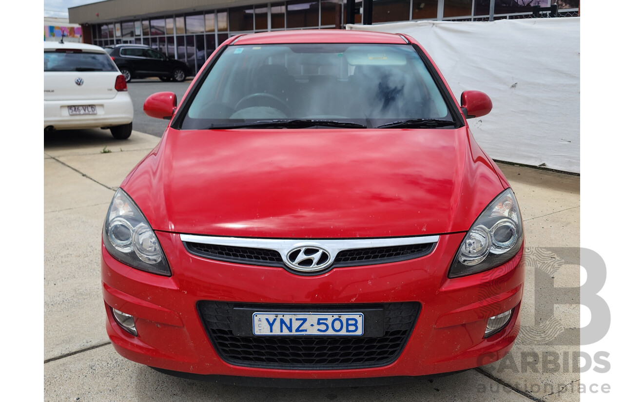 11/2010 Hyundai i30 SX FD MY10 5d Hatchback Red 2.0L