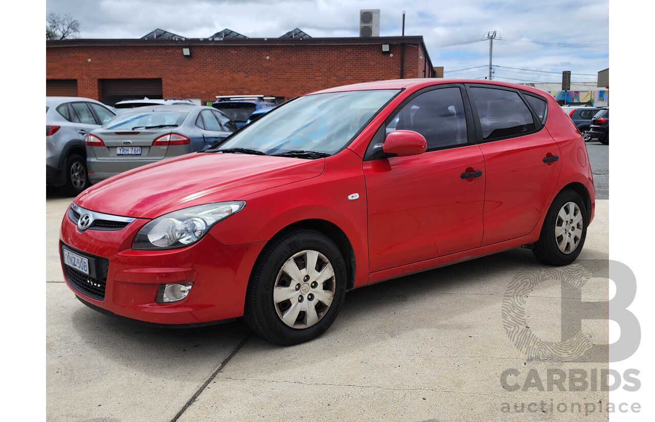 11/2010 Hyundai i30 SX FD MY10 5d Hatchback Red 2.0L