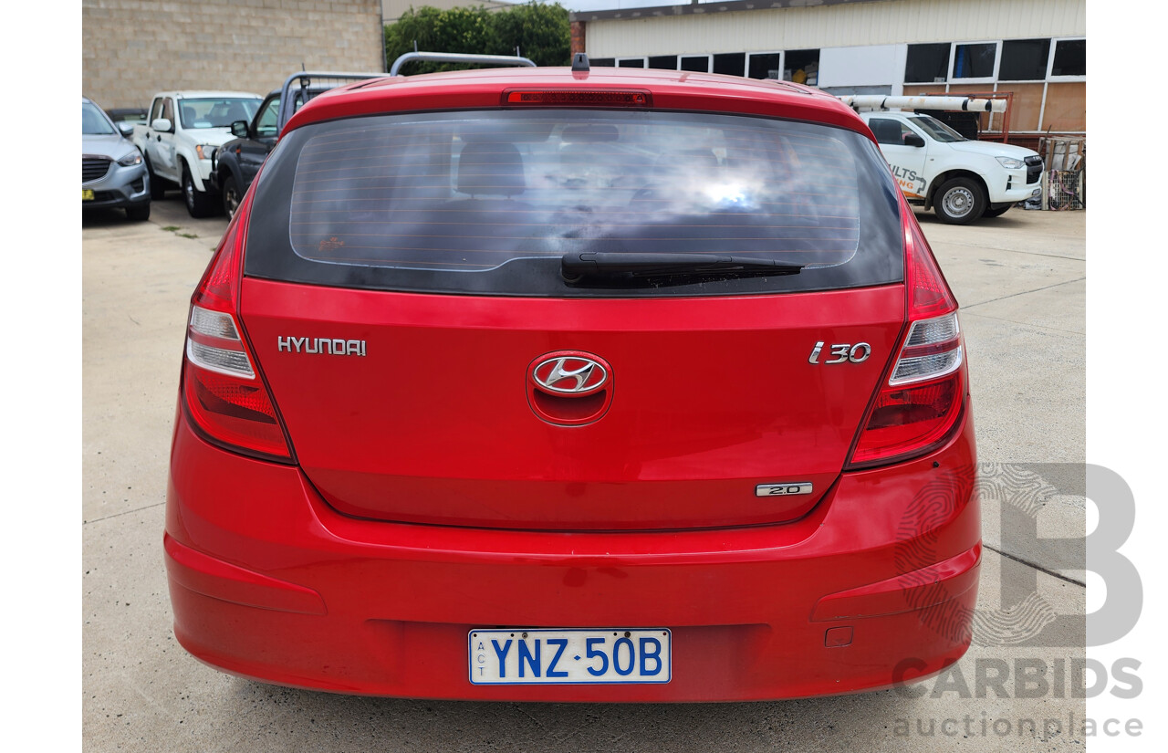 11/2010 Hyundai i30 SX FD MY10 5d Hatchback Red 2.0L