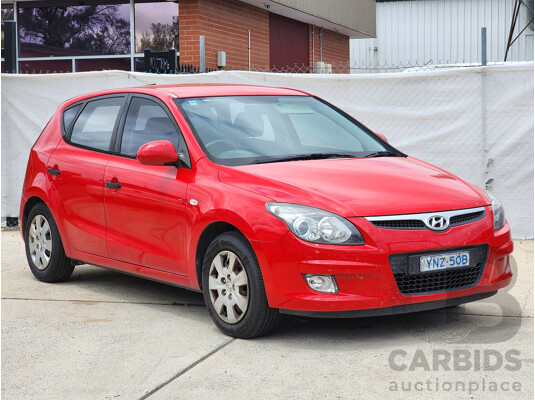 11/2010 Hyundai i30 SX FD MY10 5d Hatchback Red 2.0L