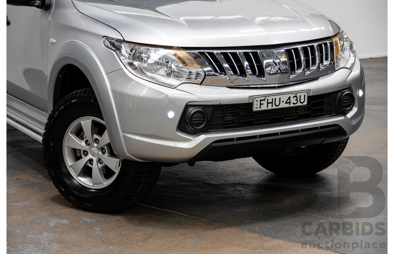 11/2015 Mitsubishi Triton GLX (4x4) MQ MY16 Dual Cab Tray Back Utility Silver Turbo Diesel 2.4L