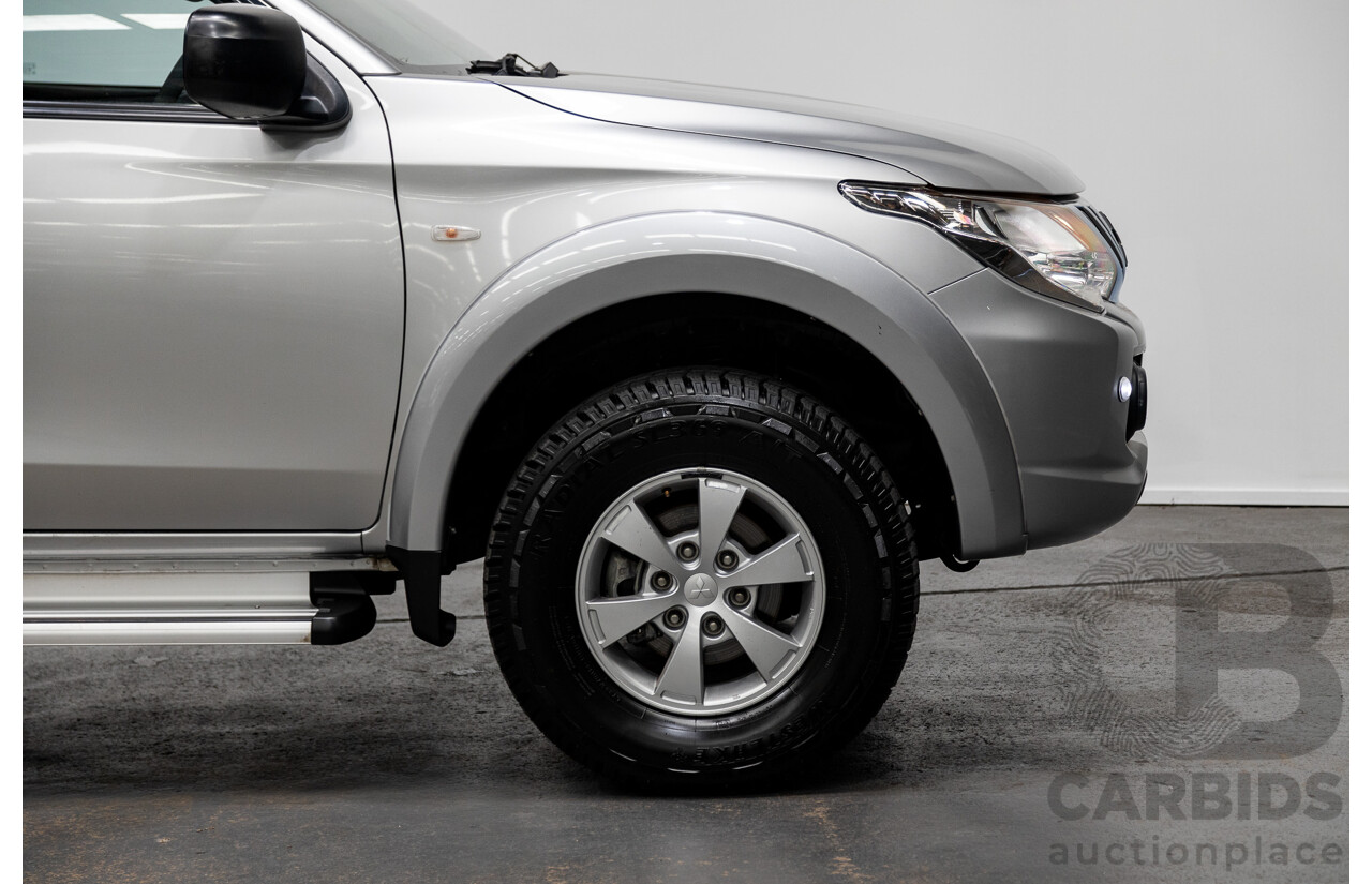 11/2015 Mitsubishi Triton GLX (4x4) MQ MY16 Dual Cab Tray Back Utility Silver Turbo Diesel 2.4L