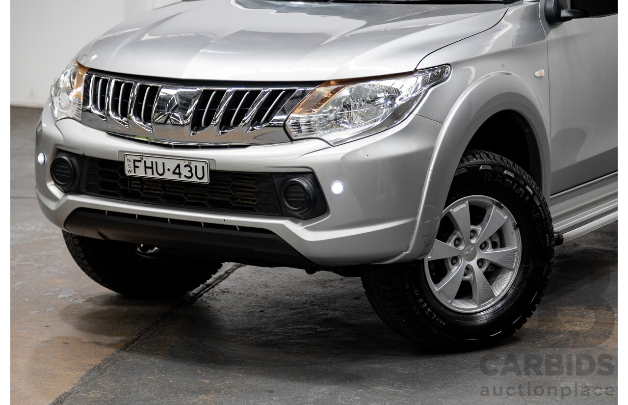 11/2015 Mitsubishi Triton GLX (4x4) MQ MY16 Dual Cab Tray Back Utility Silver Turbo Diesel 2.4L