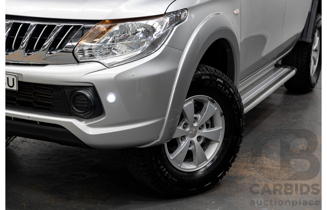 11/2015 Mitsubishi Triton GLX (4x4) MQ MY16 Dual Cab Tray Back Utility Silver Turbo Diesel 2.4L