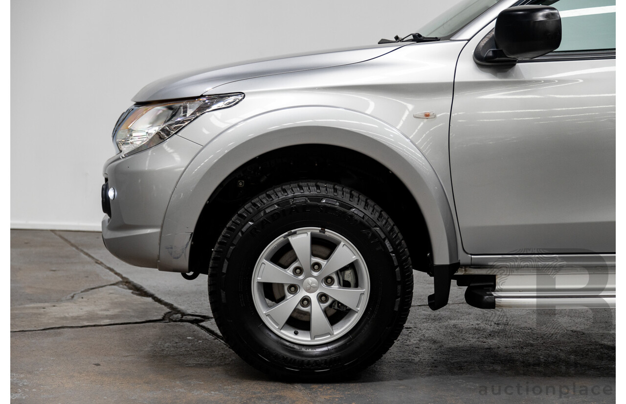 11/2015 Mitsubishi Triton GLX (4x4) MQ MY16 Dual Cab Tray Back Utility Silver Turbo Diesel 2.4L